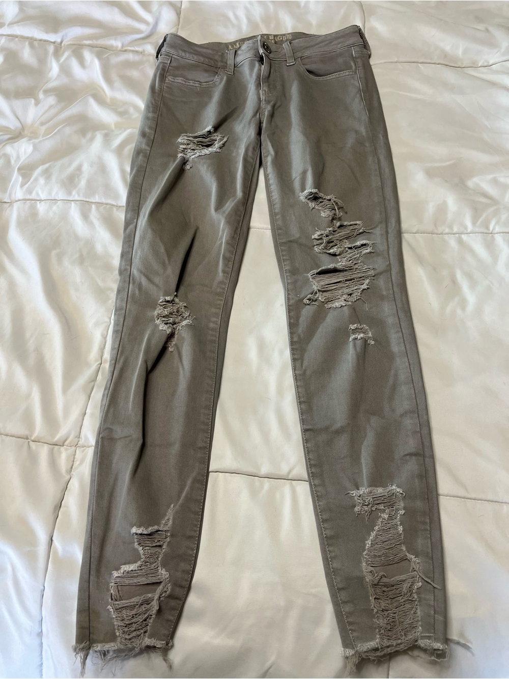 American Eagle Grey Distressed Next Level Stretch Skinny Jeans Size 4